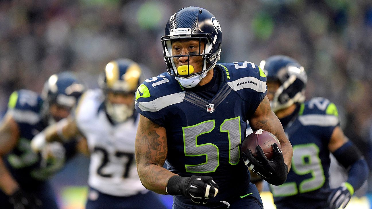 Irvin says he'd take less to stay with Seahawks