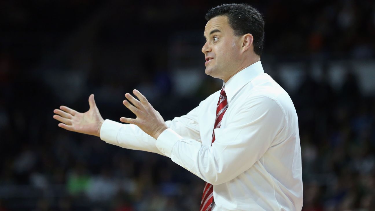 Arizona coach Sean Miller sweated through his shirt so much he had to