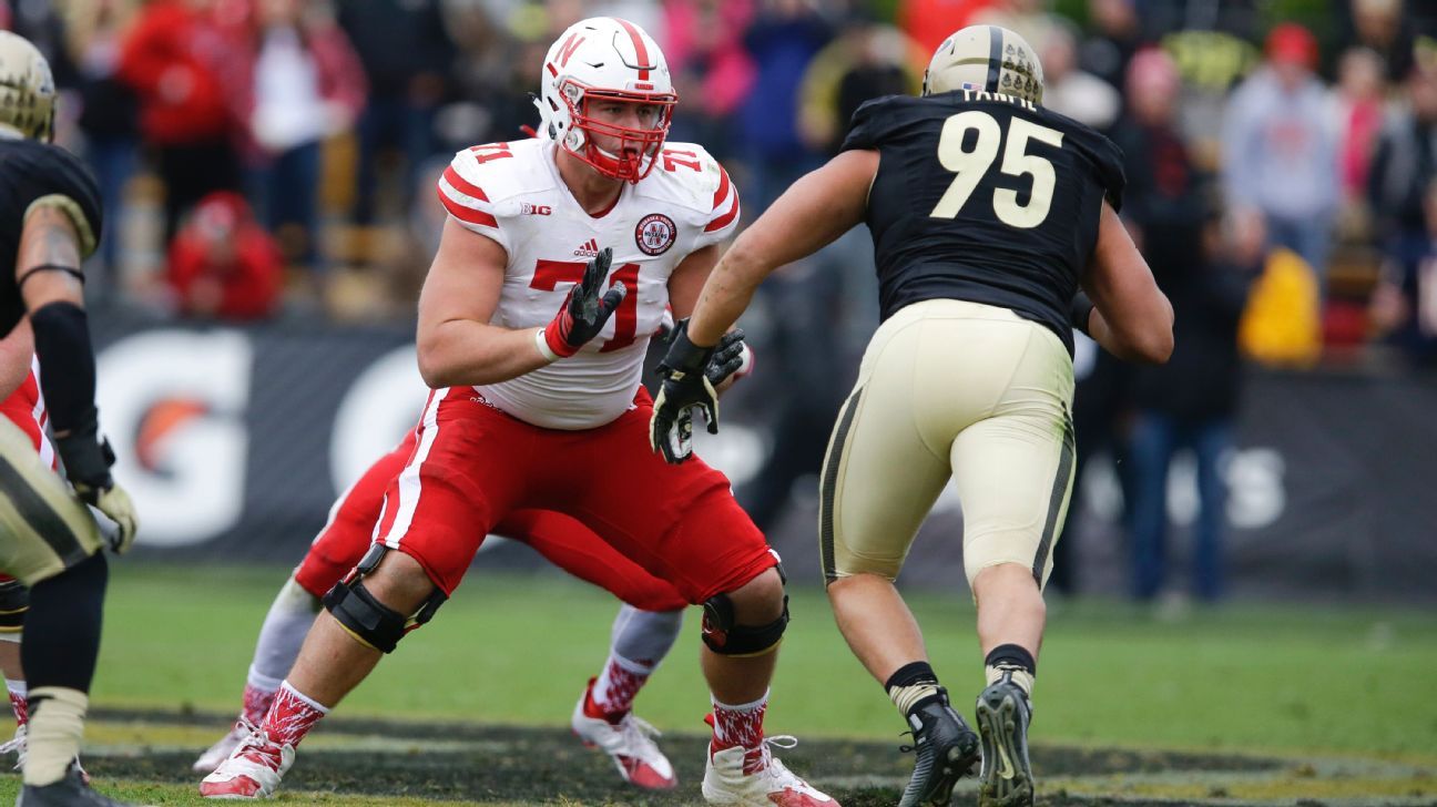 Nebraska's Alex Lewis leaves for grocery store, returns home a Raven