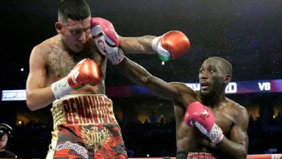 Boxing Gloves Hanging From Hook by Christian Adams