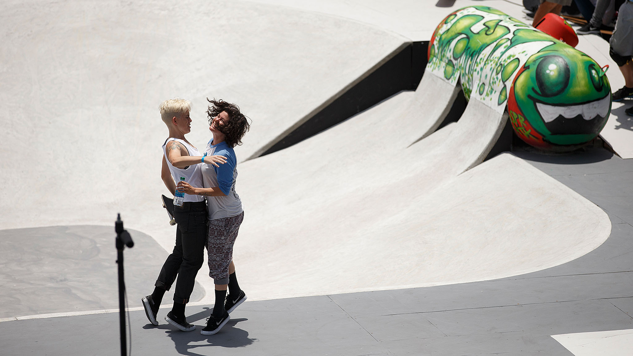It's about time, screamed women's skateboarding legend Vanessa Torres, right, as she rushed the course to congratulate Lacey Baker, left, for winning Skateboard Street on Sunday in Austin. Baker, a highly technical street skateboarder who specializes in flip tricks, already held three X Games medals -- two silvers from 2013 and one bronze from 2006 -- but this is her first gold.