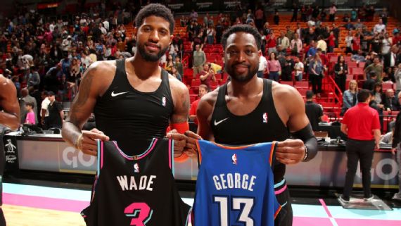 Dwyane Wade swaps jerseys with Benny the Bull after his last game