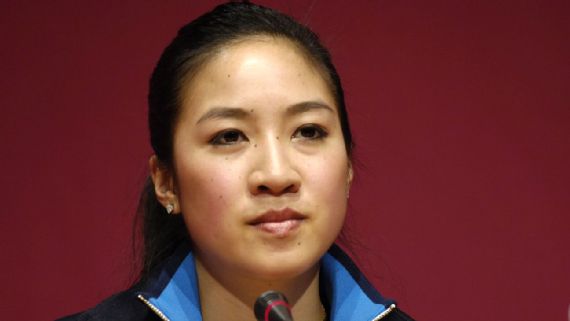 Athlete. Olympian. Chinese American. Michelle Kwan is the center