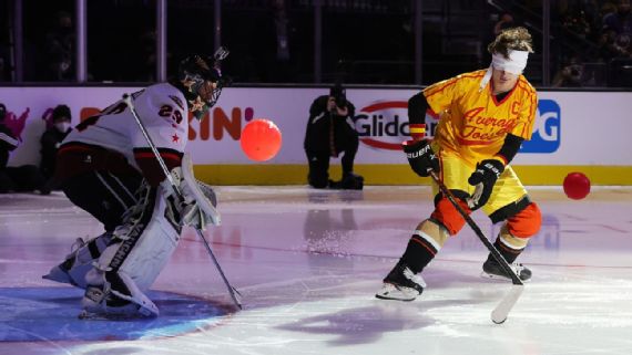 Anaheim Ducks center Trevor Zegras (11) controls the puck during the first  period of an NHL