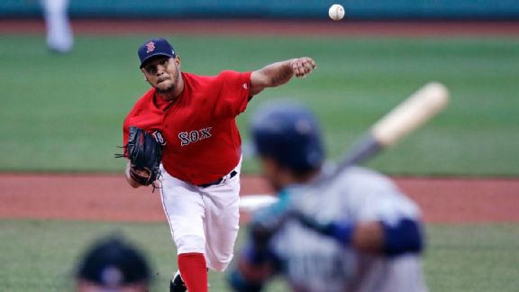 Boston Red Sox catcher Christian Vazquez jumps into Chris Sale's
