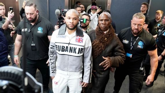 Chris Eubank Jr. and his father arrive together at the Tottenham Hotspur Stadium.