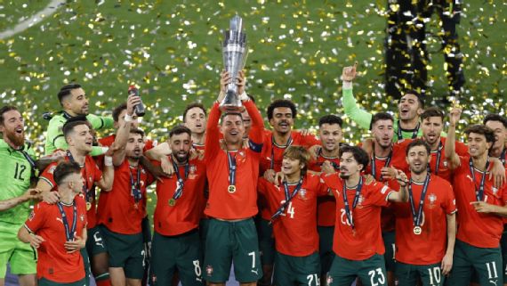 Portugal⁣ celebrates their ‍Nations League win against Spain.