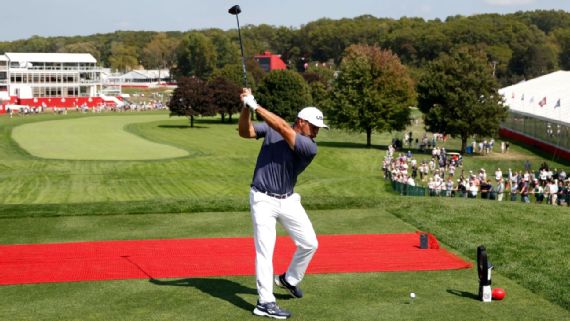 Bryson DeChambeau tees off during practice