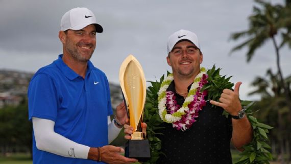 Chris Gotterup celebrating his Sony Open win with caddie Brady Stockton