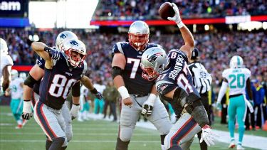 Gronk doing Gronk things at the Super Bowl parade (via Mike Reiss/ESPN)