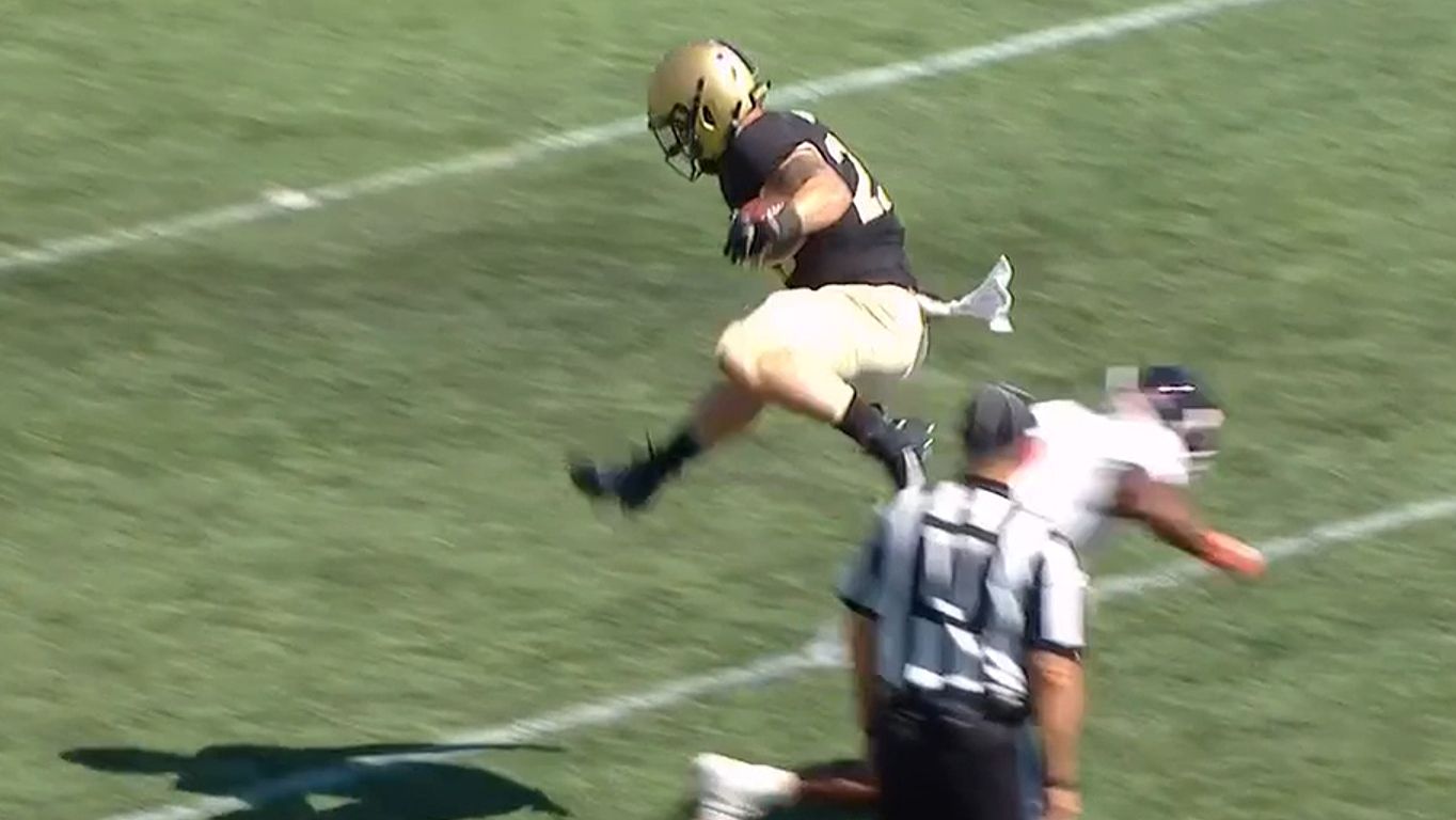 Army RB hurdles defender for first down ESPN Video