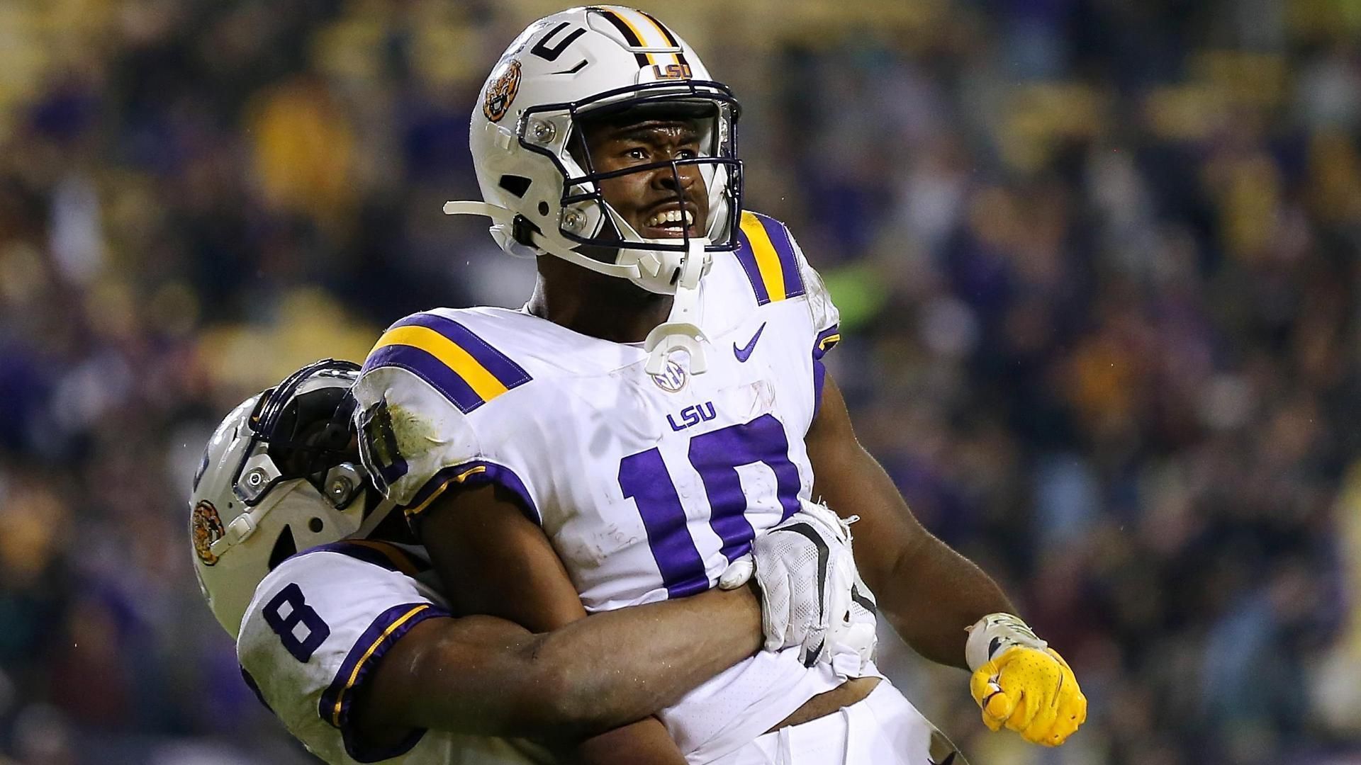 LSU QB throws goahead TD under intense pressure with 20 seconds left