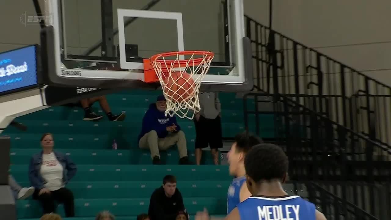 Mike Meadows absorbs the contact for a Saint Louis and1 ESPN Video