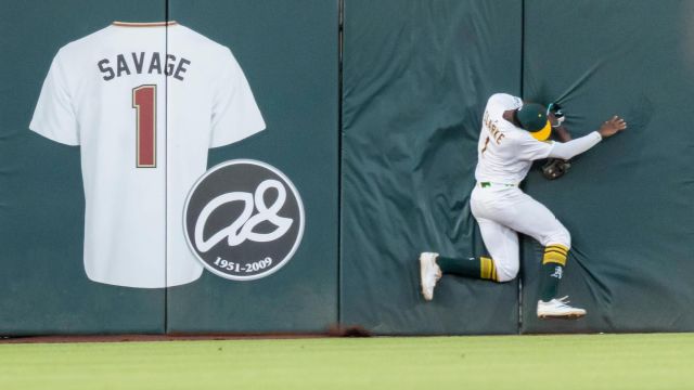 MLB Catches 2025: Top Plays & Rankings | Denzel Clarke, J-Rod Denzel Clarke crashing into the wall to make a spectacular catch.