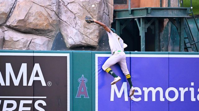 MLB Catches 2025: Top Plays & Rankings | Denzel Clarke, J-Rod Denzel Clarke makes an amazing catch, reaching over the wall to rob a home run.