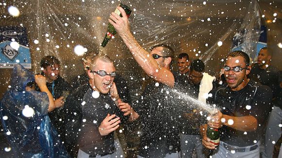 With pop in bats, Phils pop champagne corks