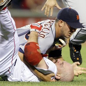 Photo: Boston Red Sox's Kevin Youkilis is hit by a pitch against