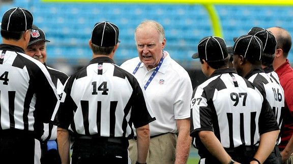 Denver Broncos Head Coach John Fox has a chat with Head Linesman