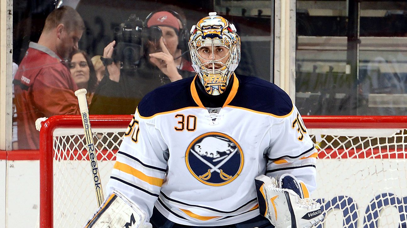 Former Buffalo Sabres goaltender Ryan Miller waves to the crowd as