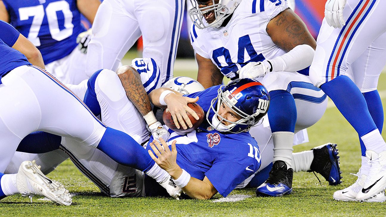 New York Giants Antrel Rolle intercepts a pass intended for Dallas