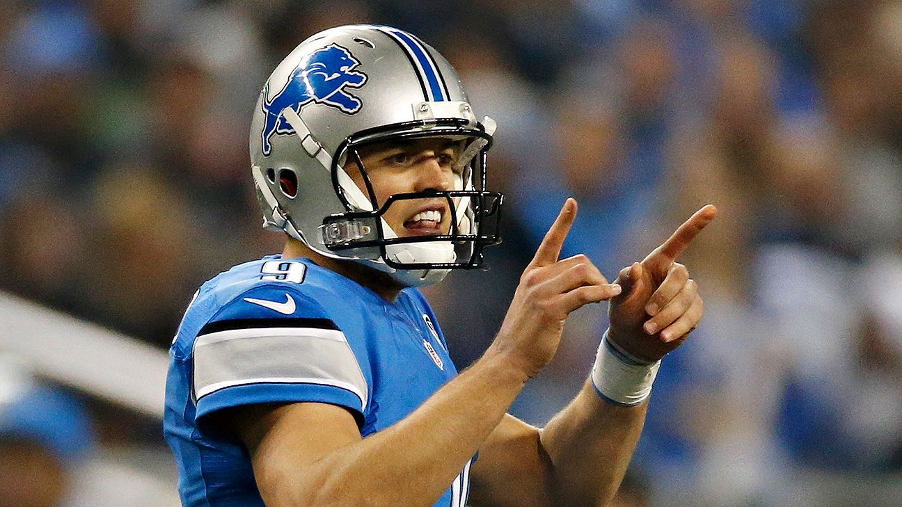 Detroit Lions quarterback Matthew Stafford wears a baseball cap sitting on  the bench after being replaced in the fourth quarter with a large lead over  the Denver Broncos at Sports Authority Field