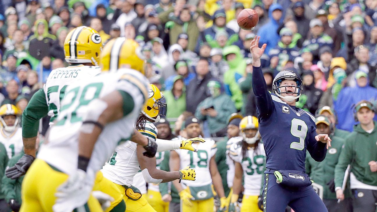 Punter Jon Ryan of the Seattle Seahawks looks on from the sideline