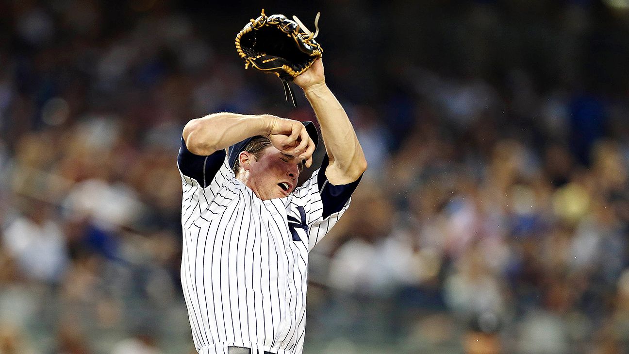 New York Yankees manager JOE GIRARDI takes the ball from BRYAN MITCHELL