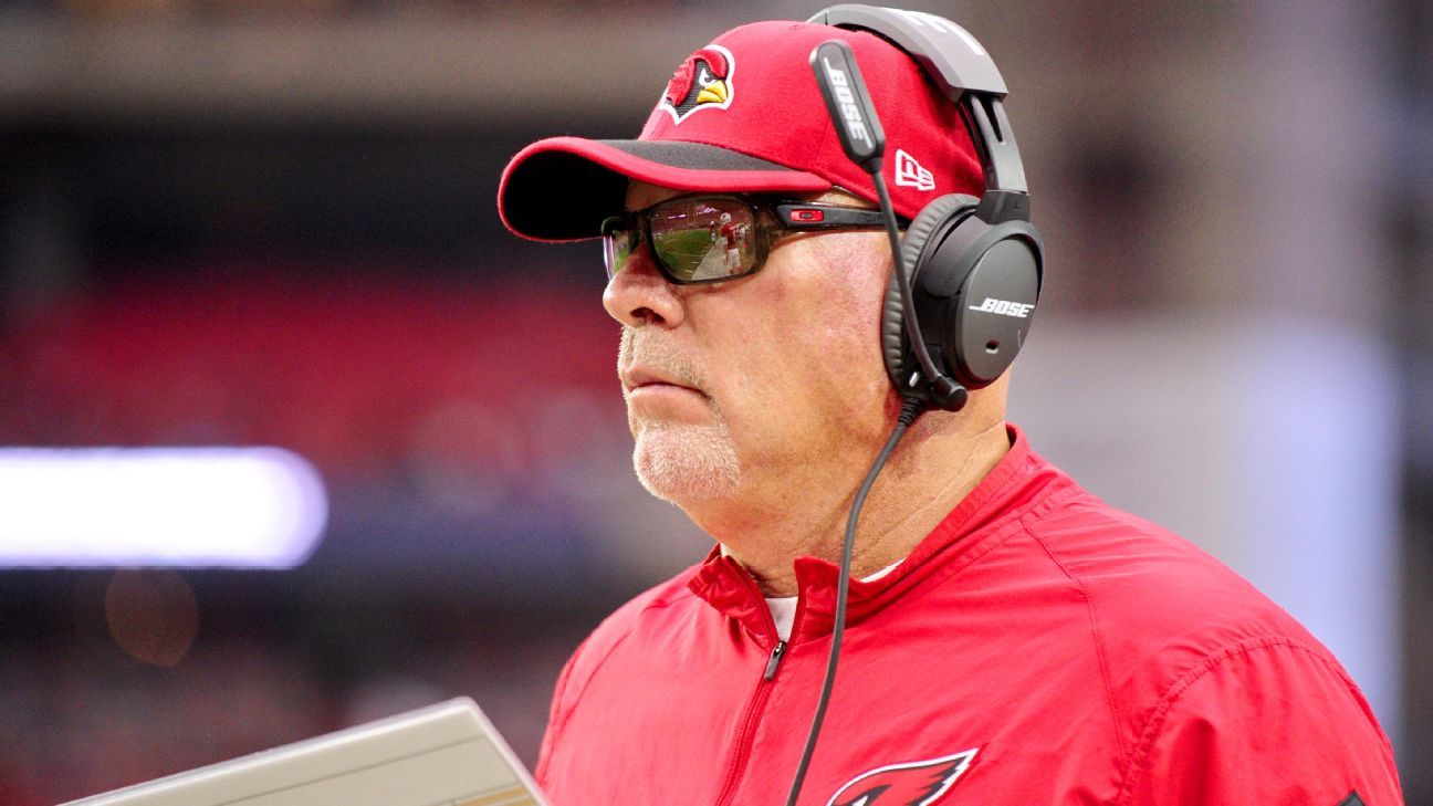 What is Buccaneers coach Bruce Arians wearing around his chest?