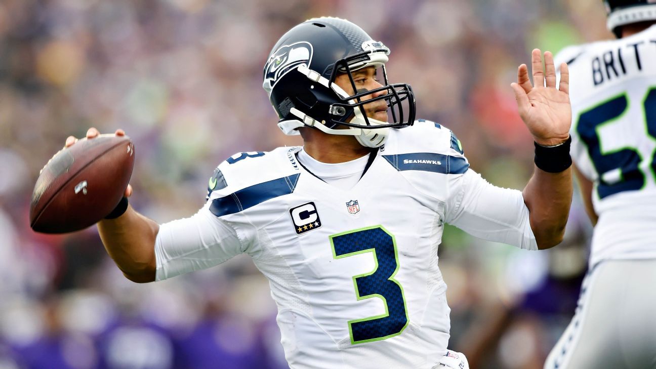 Seattle Seahawks' Russell Wilson throws three touchdown passes again