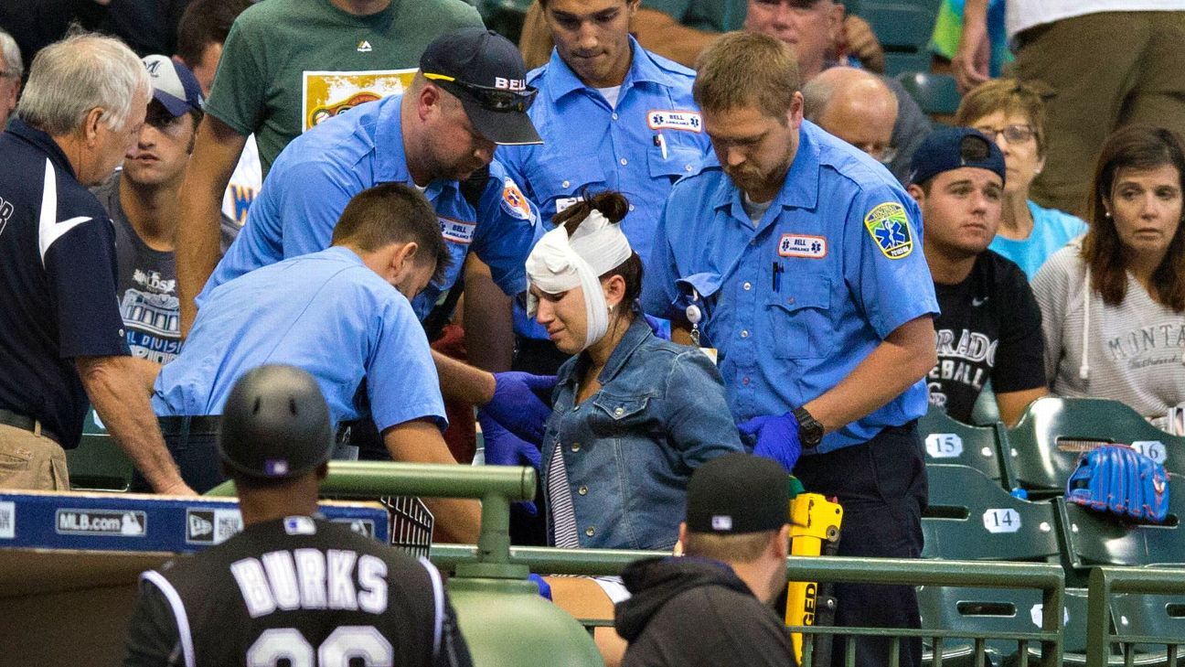 Fan hit in ear by line drive during Brewers/Rockies game