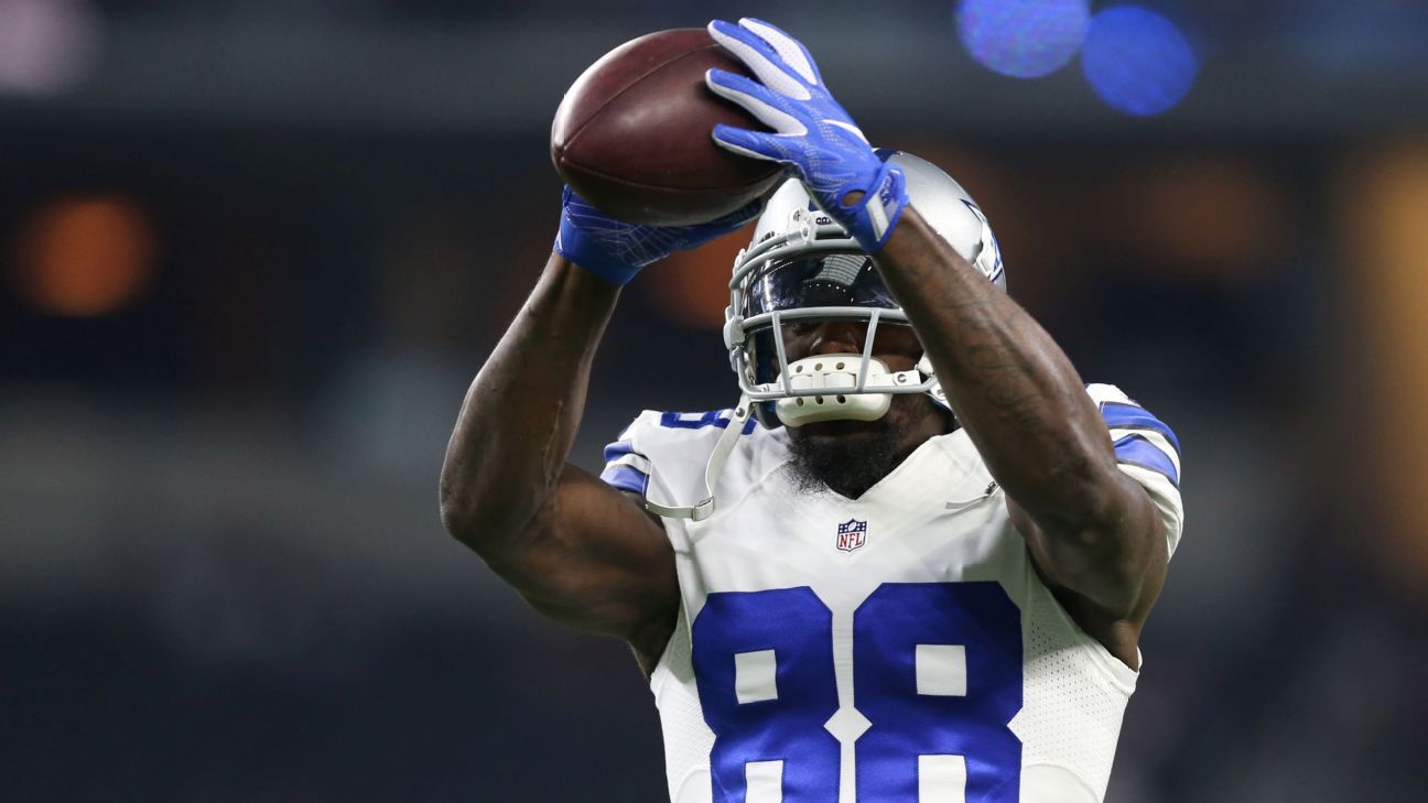 Referee Jerome Boger tests a Microsoft Surface Replay display before an NFL  football game between the Carolina Panthers and Dallas Cowboys, Sunday,  Oct. 3, 2021, in Arlington, Texas. Dallas won 36-28. (AP