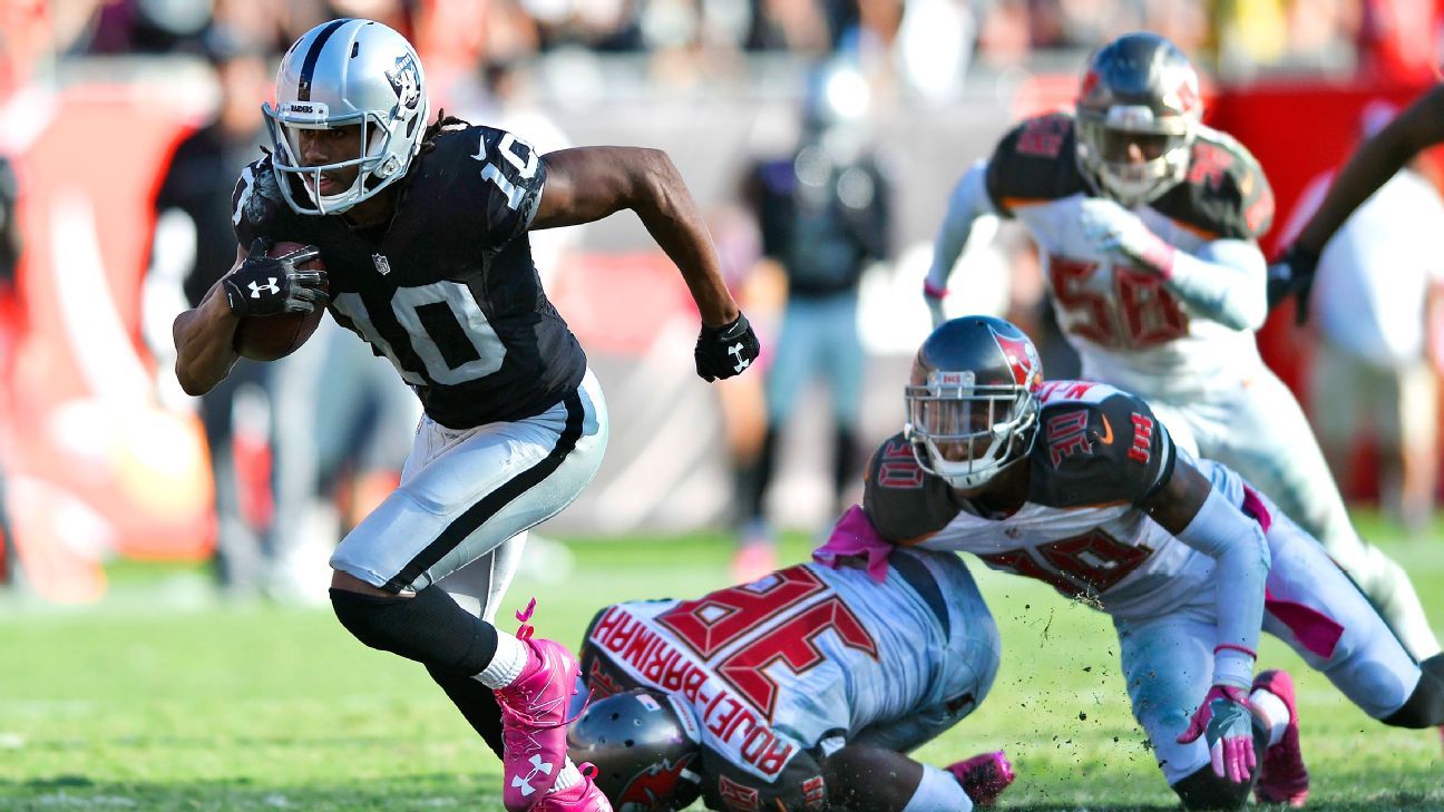 Raiders set passing, penalty records in OT victory over Buccaneers