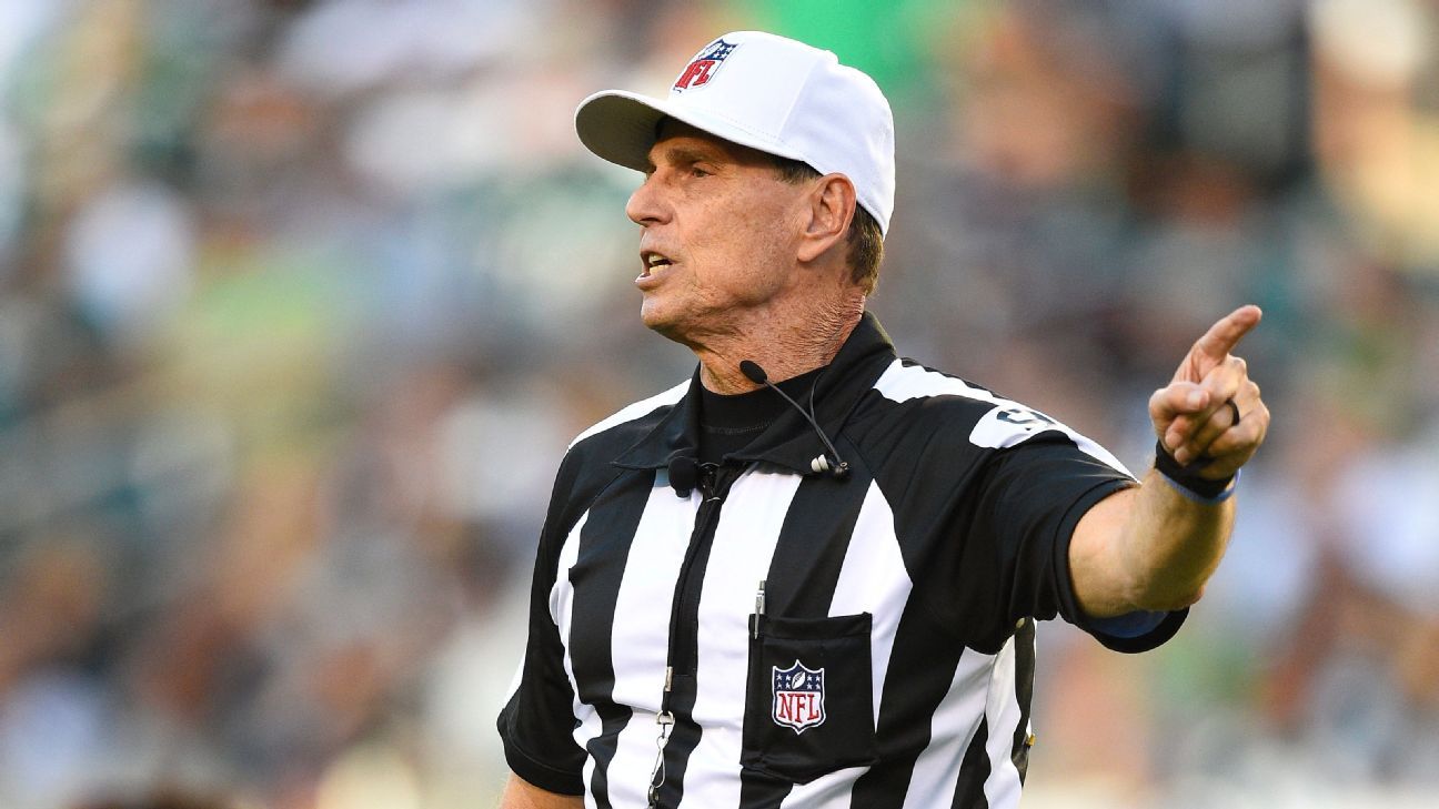 Referee Tony Corrente (99) uses a Microsoft Surface to watch a replay  during the second half of an NFL preseason football game between the Carolina  Panthers and the Houston Texans, Wednesday, Aug.