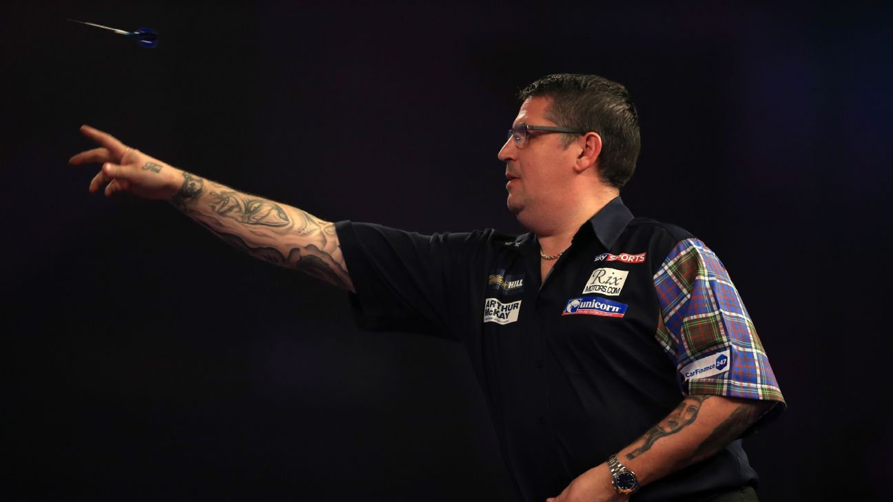 Defending champion Gary Anderson safely through at Alexandra Palace - ESPN