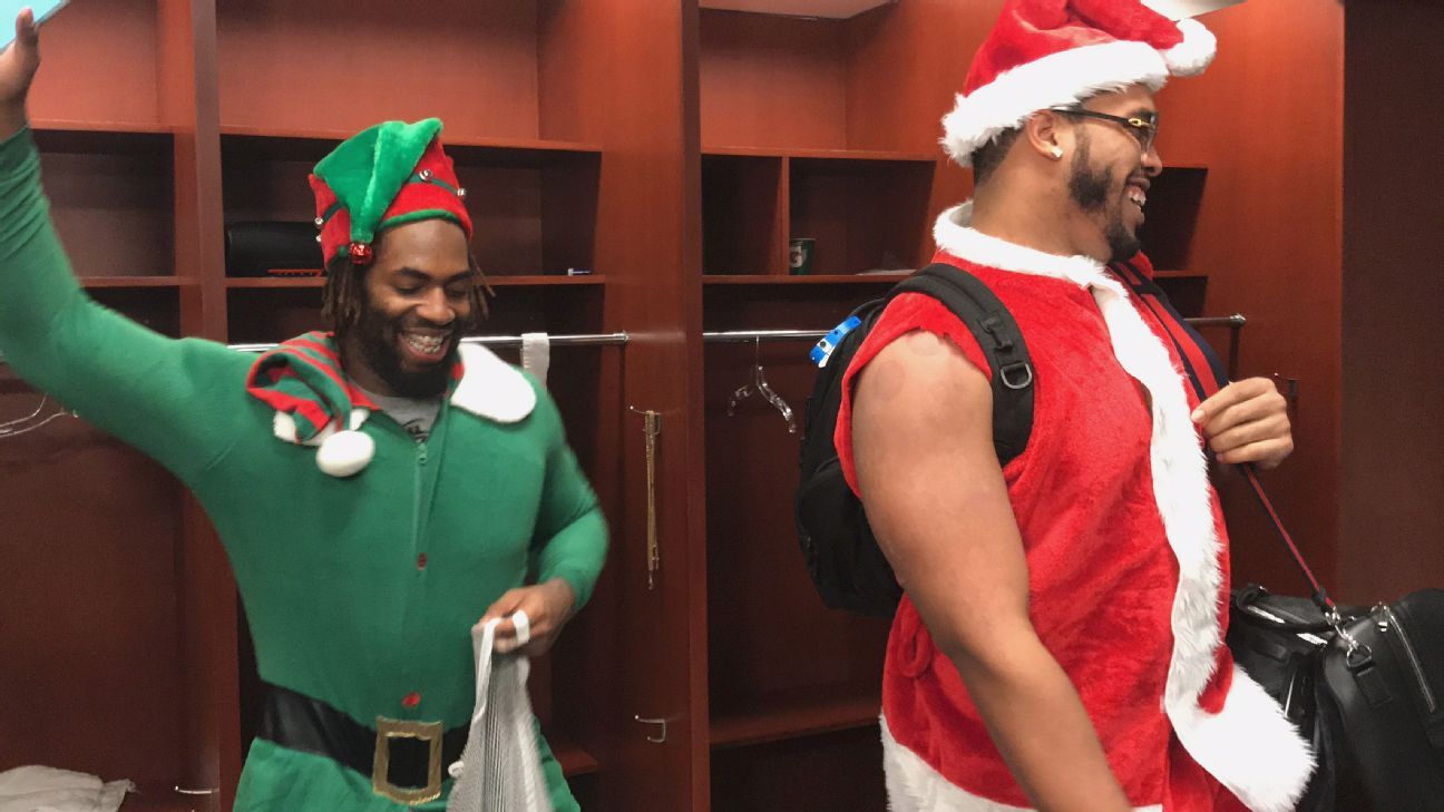 Baltimore Ravens celebrate victory by donning Christmas clothes