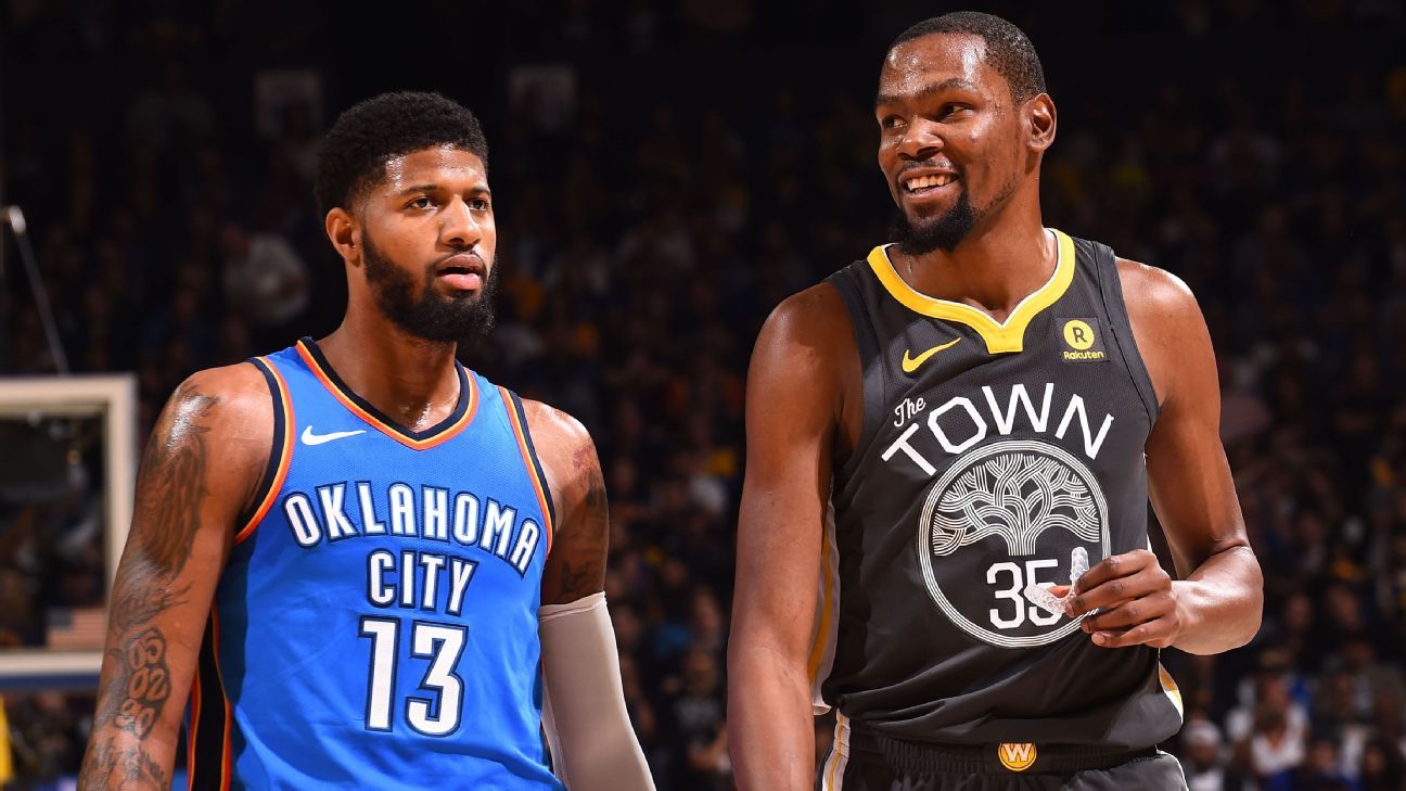 Kevin Durant giving away true height by standing next to DeMarcus