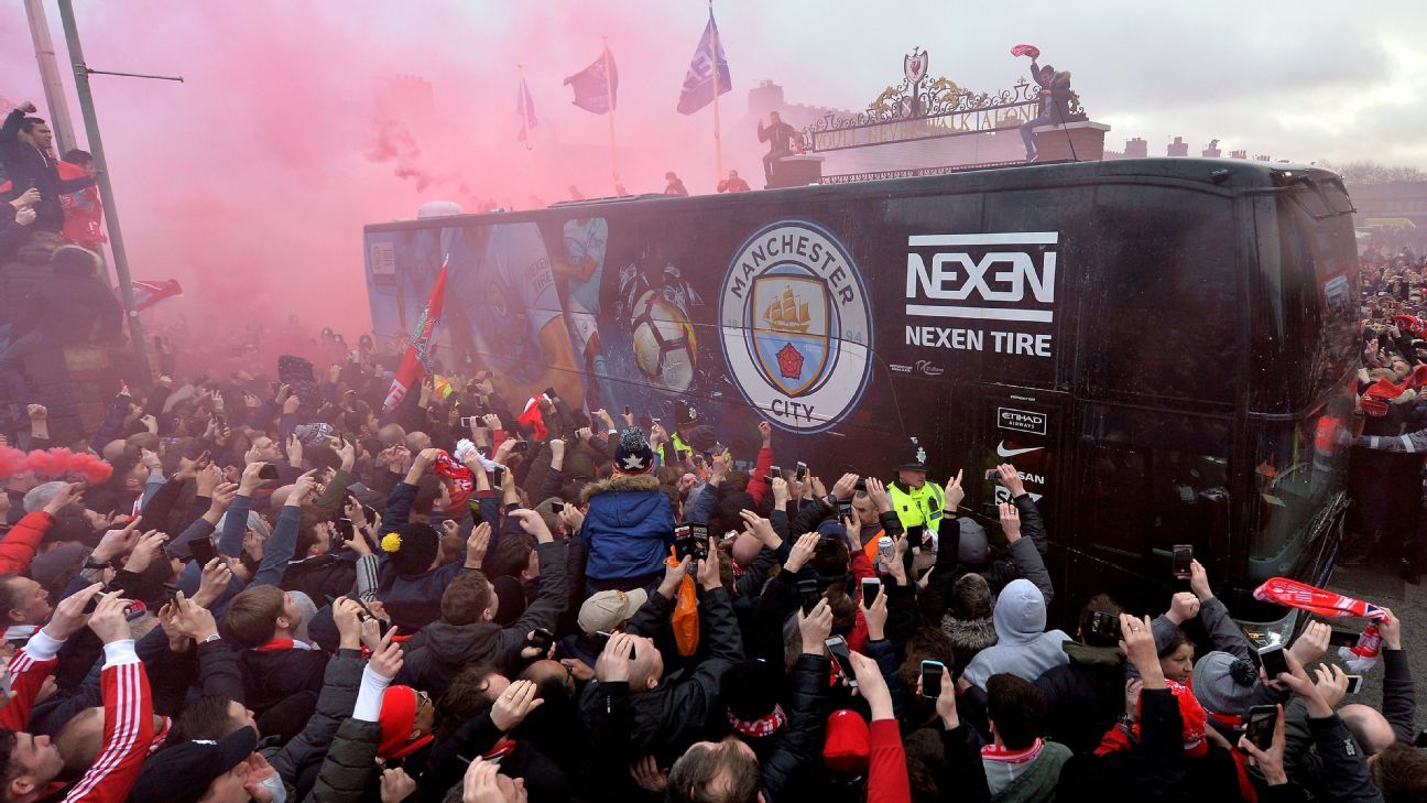 Liverpool fans throw bottles and aim fireworks at ...