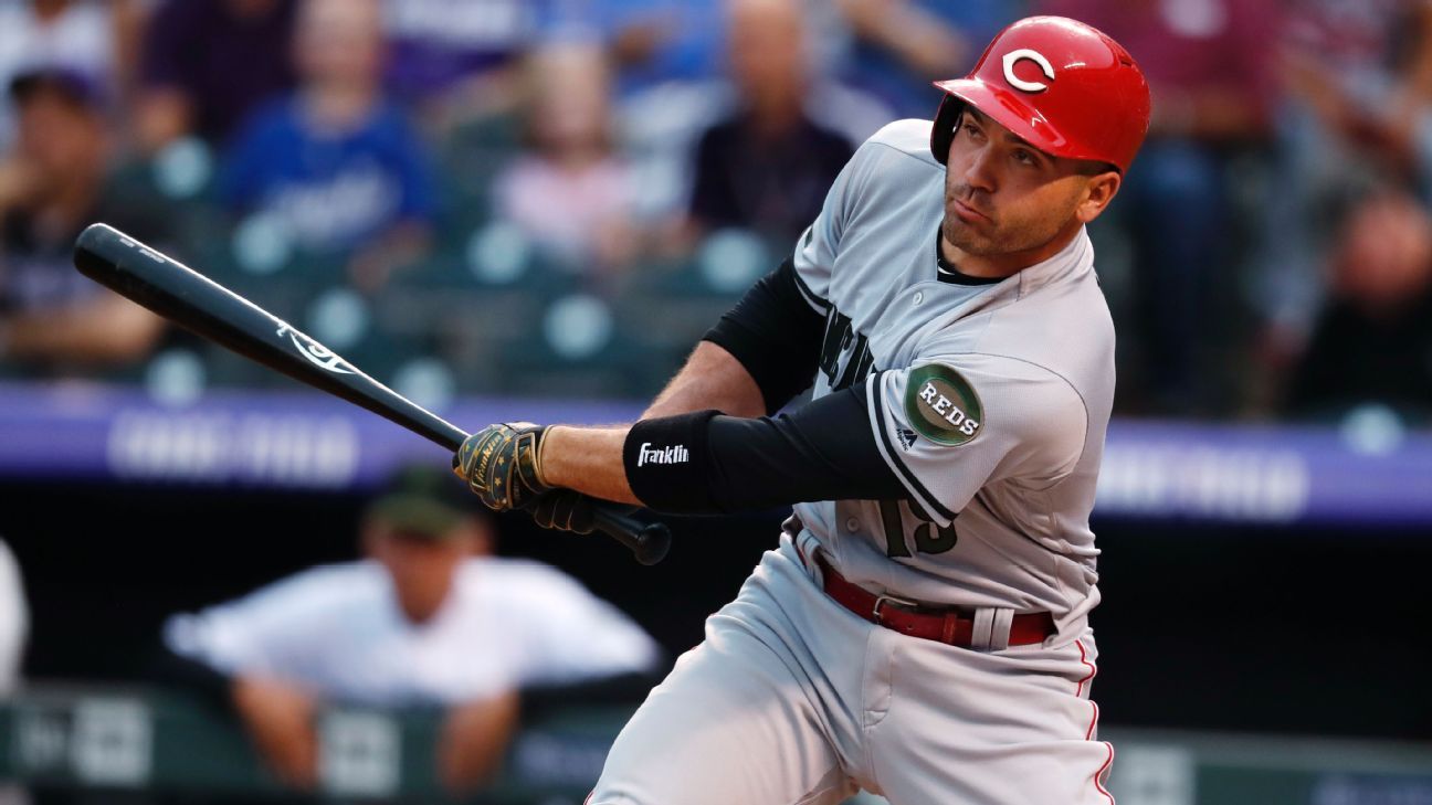 Votto traded his jersey for a Reds fan's shirt