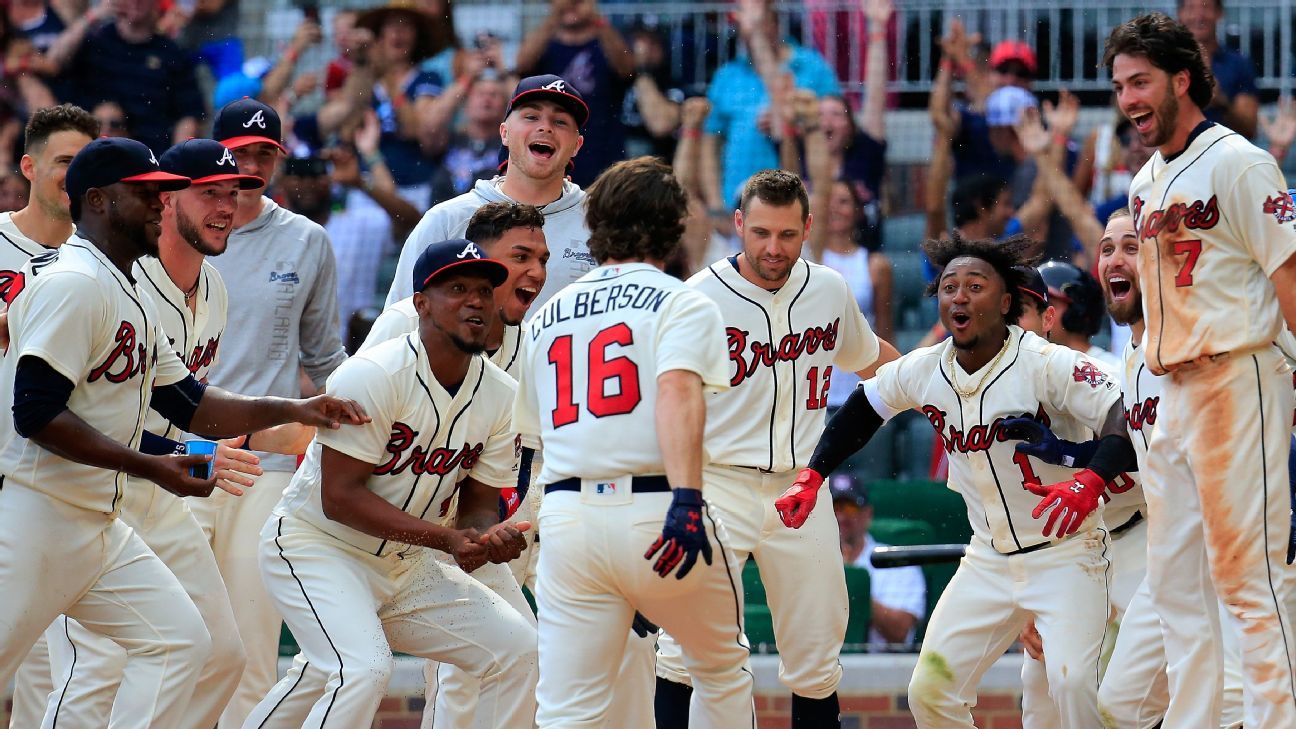 Atlanta Braves left fielder Charlie Culberson comes off the field