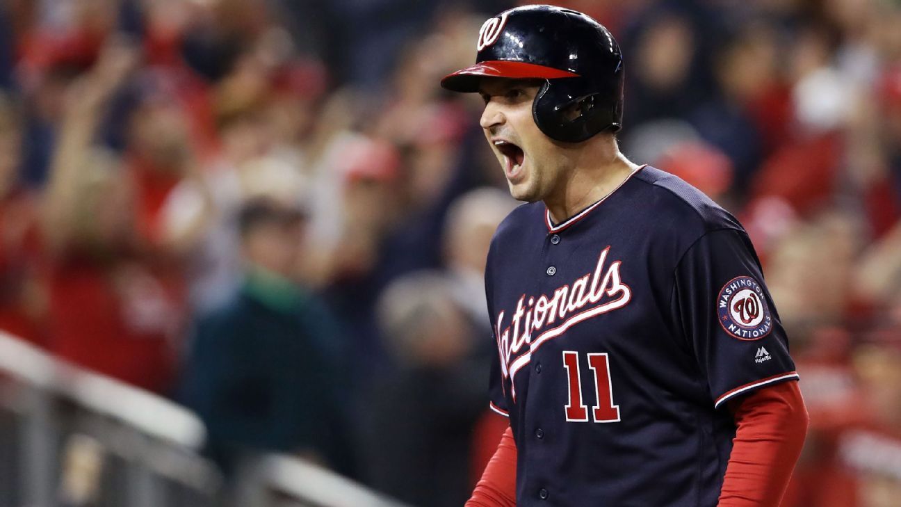 Washington Nationals' Ryan Zimmerman is wearing a jersey spelled Natinals  after hitting a single to center field during the third inning of a  baseball game against the Florida Marlins in Washington, Friday