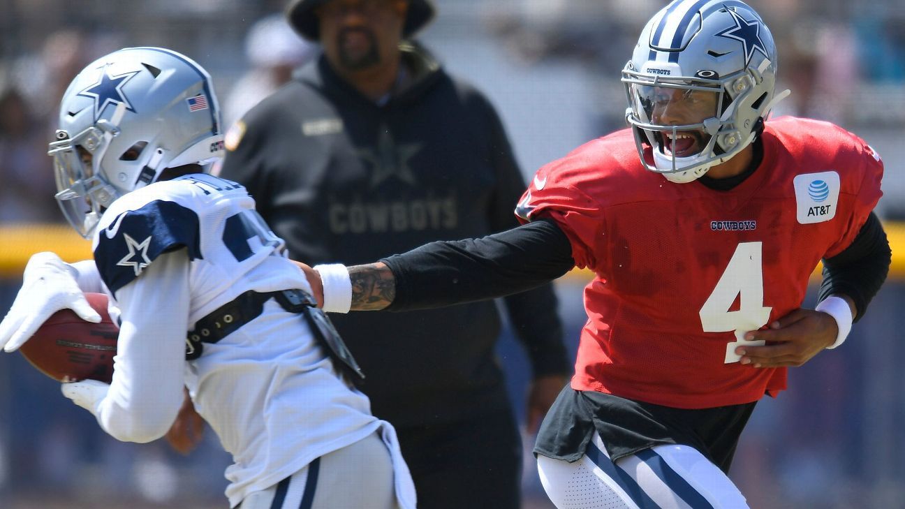 Cowboys training camp photos: Quarterback Dak Prescott rolls out to throw a  dime