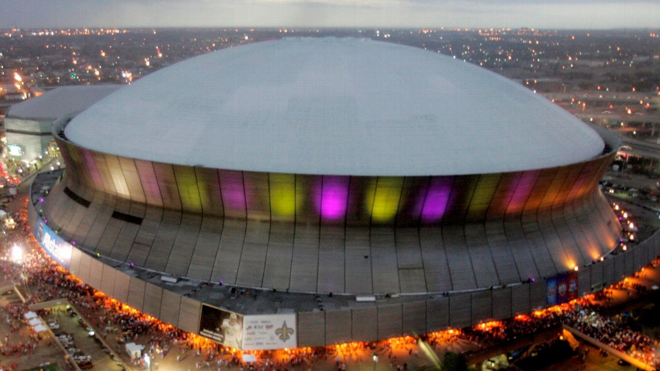 Saints fans celebrate a win inside the Superdome, around the city amid  COVID-19 pandemic