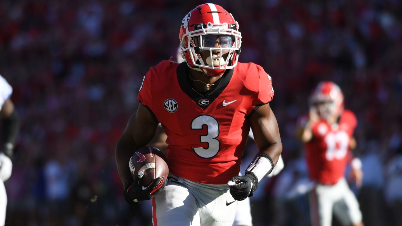 Georgia Bulldogs leading rushers Zamir White, James Cook and top tackler Lewis C..