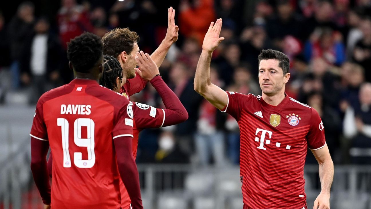 Lewa scores three as Bayern reach UCL knockouts