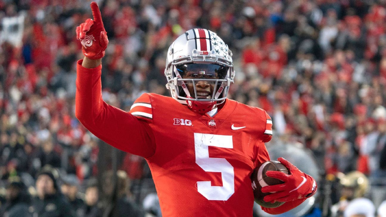 Chris Olave of the Ohio State Buckeyes celebrates after a touchdown