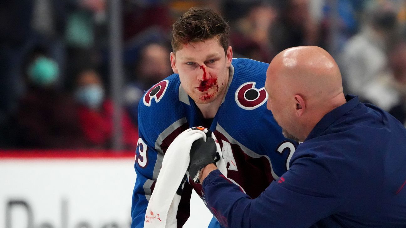 Colorado Avalanche's Nathan MacKinnon bloodied on Taylor Hall's