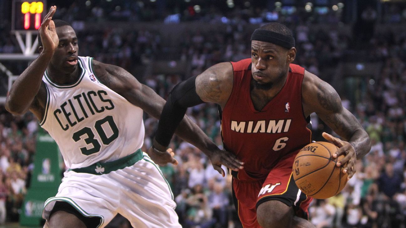 Miami Heat's LeBron James (6) and Boston Celtics' Kevin Garnett (5