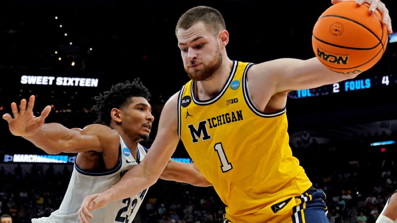 Dickinson puts NBA on hold to return to Michigan