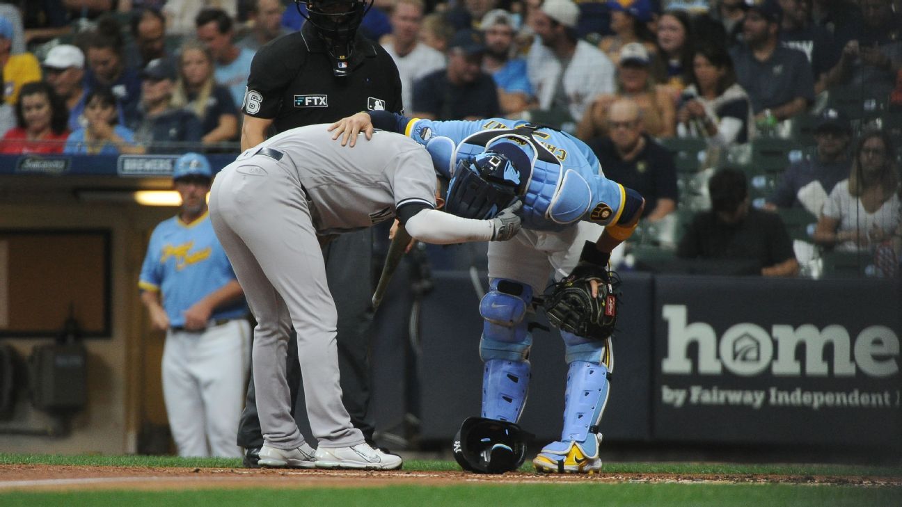 Marwin Gonzalez of the New York Yankees flips the ball to Ron