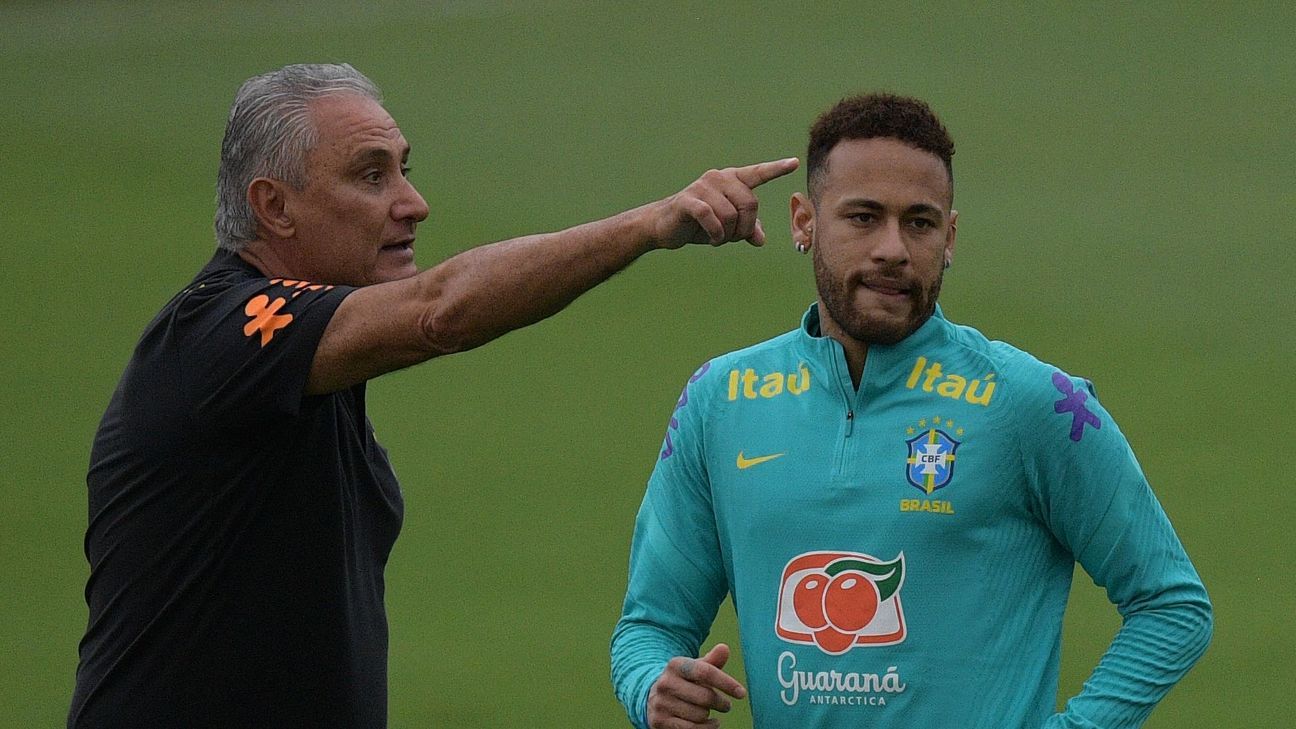 Brazilian football star Neymar, left, or Neymar Jr., poses as he